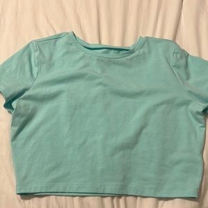 Target baby tee super comfortable and flattering! Sized XL